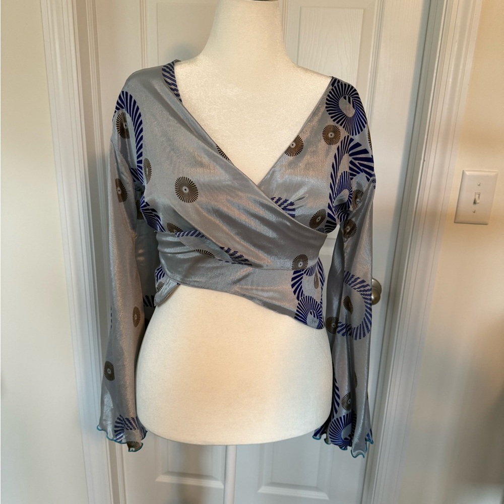 Elegant Gray Wrap Top with Blue Accents